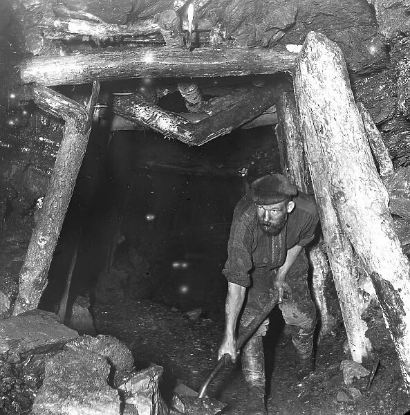 Miner working in Plas y Coed Level, South Wales