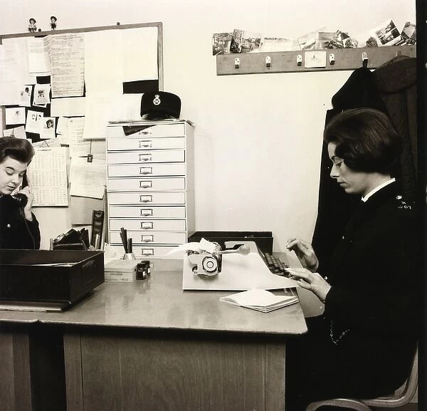 Woman police officer working in a police station