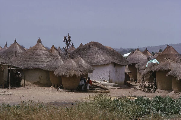 20031157. NIGERIA Uke Circular thatched mud huts in the village between Abuja