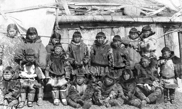 SIBERIA: ESKIMOS, c1897. A group of Eskimo school children posing in front of the