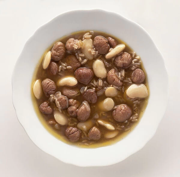 Bowl of Sopa de castanhas piladas, soup containing chestnuts, beans and rice, a traditional dish from Tras-os-Montes, Portugal, view from above