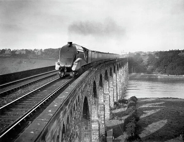Coronation A4 Class steam locomotive crosses the Royal Border Bridge at Berwick-upon-Tweed