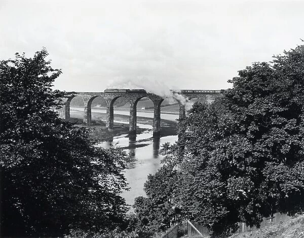 LNER class A4 steam locomotive crossing Royal Border Bridge, c 1938