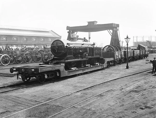 Locomotive being carried on wagons, 1914