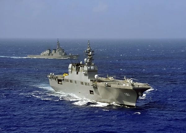 JDS Hyuga sails in formation with U. S. Navy and Japan Maritime Self Defense Force ships