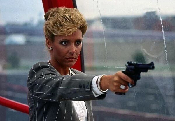 Diane Keen holding pistol gun August 1987