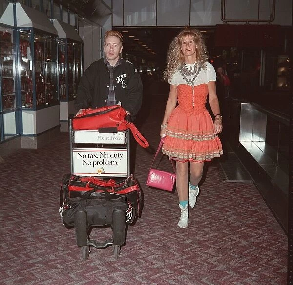 John Lydon singer of Public Image and wife Nora at London Airport, May 1990