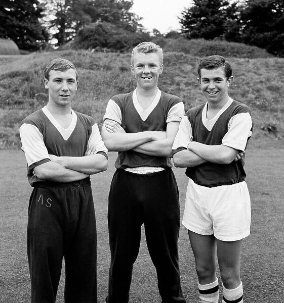 West Ham United footballer Bobby Moore pictured alongside teammates Andy Smillie (left