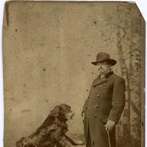 Studio portrait, man with his dog
