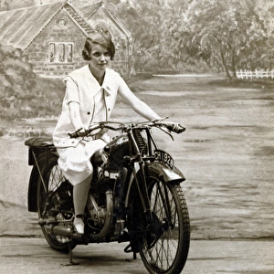 Young lady on a 1928 / 9 veteran JAP engined motorcycle
