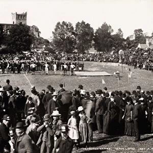 View of people gathered for Jedburgh games, including five entrants in the 1