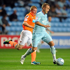 Clingan vs. Southern: Battle for Supremacy in Coventry City vs. Blackpool Championship Clash (September 2011)