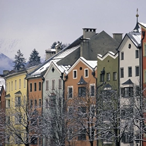 Austria, Tirol, Innsbruck. Colorful buildings along Inn River
