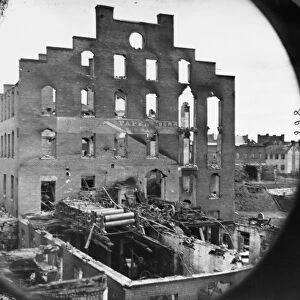 CIVIL WAR: RICHMOND, 1865. The ruins of a paper mill with wrecked paper-making machinery in the foreground at Richmond, Virginia following the American Civil War. Photograph, April 1865