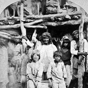 NEW MEXICO: ZUNIS, 1873. Group of Zuni Native Americans, with an albino boy
