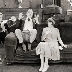 SILENT FILM STILL: GUNS. Larry Semon and Dorothy Dwan in a film from the 1920s