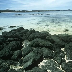 Fiji, Yasawa Archipelago, Yasawa Island, Nasimasima beach, basaltic rocks