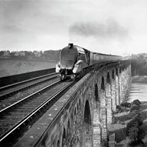 Coronation A4 Class steam locomotive crosses the Royal Border Bridge at Berwick-upon-Tweed