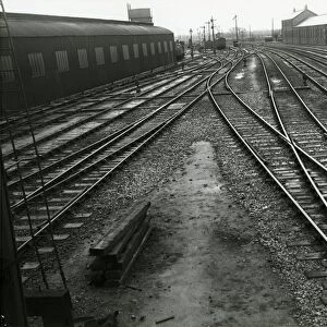 Ely, looking South from the station south signal box towards Cambridge. Engine shed on left