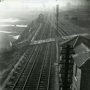 Ely North Junction signal box at left, view looking south. The March line joins the