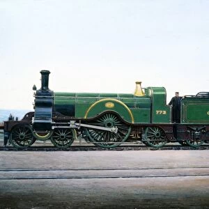 Painted photograph by F Moore showing a 4-2-2 steam locomotive of the Great Northern Railway (GNR)