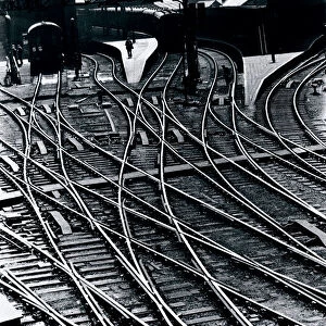 Photograph by Cyril Herbert, showing a graphic high level view of railway tracks
