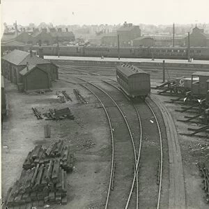 View of north end of station platform, with locomotive running shed in background