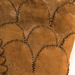 Detail of a mans armoured glove, c. 1600-50 (heavy buff leather)
