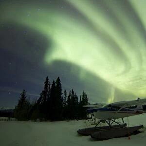 Aurora borealis with float plane, Whitehorse, Yukon, Canada