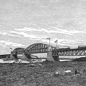 Metal bridge for railway over the Rhine river near Arnhem, engraving 1879