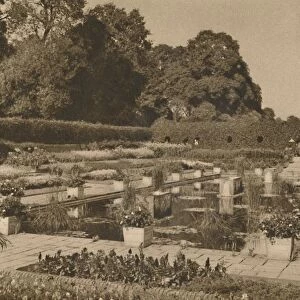 The Quiet of the Dutch Garden at Kensington Palace Guarded By Locked Gates, c1935