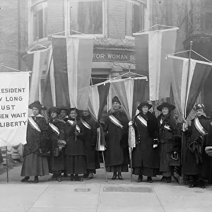 Woman Suffrage - Group Leaving Headquarters, 1917. Creator: Harris & Ewing. Woman Suffrage - Group Leaving Headquarters, 1917. Creator: Harris & Ewing