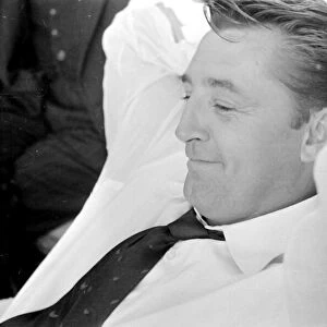 Actor Robert Mitchum during a press interview in London