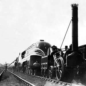 The L. M. S. engine Coronation a new streamlined train with the famous George Stephenson
