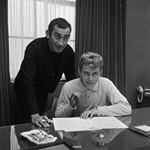 Lionel Bart (standing) at his office in Shaftesbury Avenue, with Shane Fenton