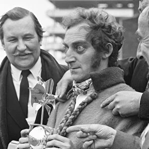 Marty Feldman seen here on his return from the Monteaux TV awards with his award for best