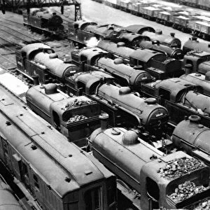 Outside Kings Cross engine sheds locomotives stand idle on 1st June 1955 - a sight