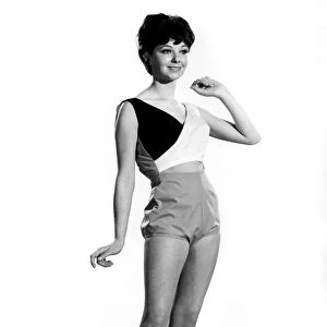 Reveille Fashions: Meriel Weston modeling a beach suit consisting of a bra top and shorts