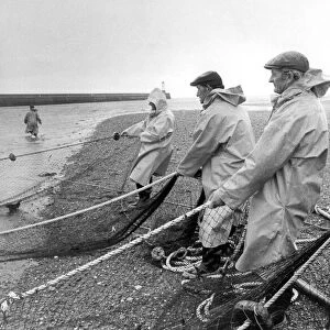 Salmon men hauling in the nets on the River Tweed at Berwick in 1980