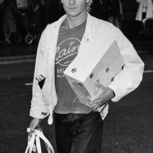 Sting singer with pop group Police aka Gordon Sumner 1983 arriving at Heathrow