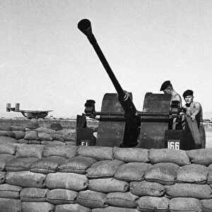 Suez Crisis 1956 On a British airbase in Cyprus the crew of an anti aircraft gun