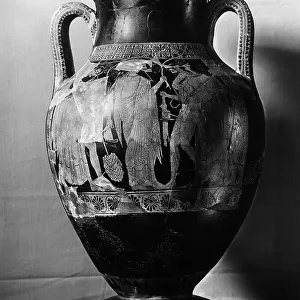Greek red figure amphora depicting a coming home from the Saturnalia, in the National Museum of Tarquinia, in Tarquinia
