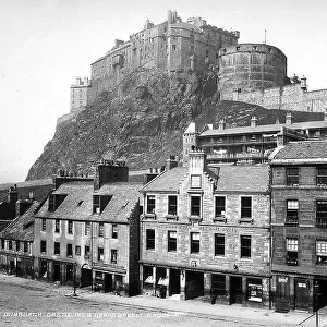 View of Edinburgh's Castle. In the foreground, faades of some buildings