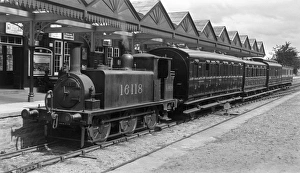 AStrathpeffer with passenger train at Strathpeffer Station, Scottish Highlands AStrathpeffer with passenger train at Strathpeffer Station, Scottish Highlands